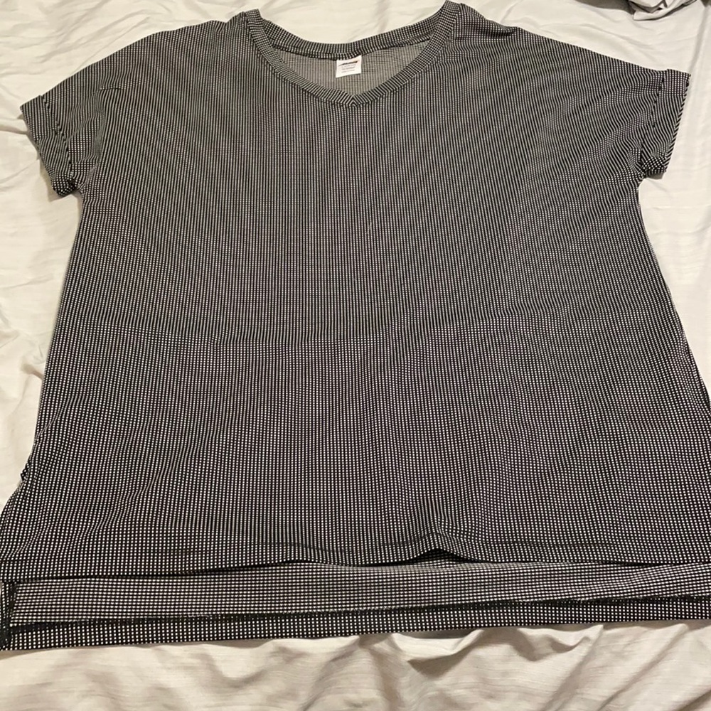 Black with white polka dot athletic shirt